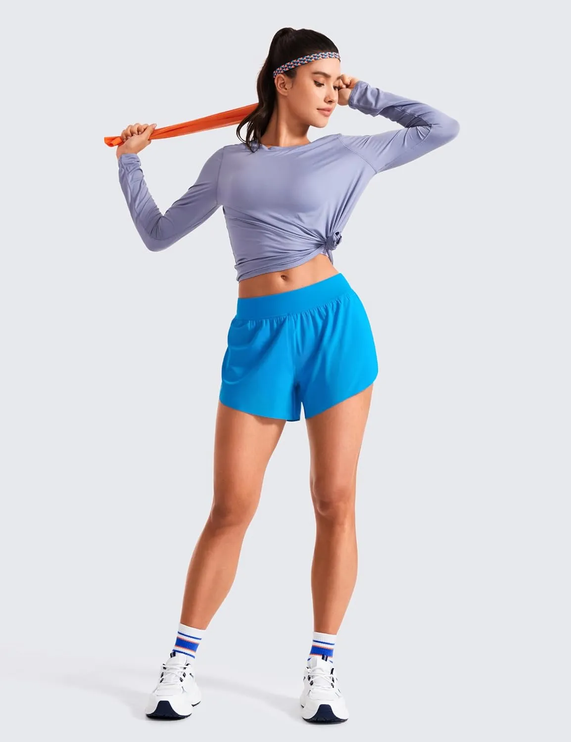 CRZ YOGA Mid Waisted Dolphin Athletic Shorts for Women 4" Lightweight High Split for Gym Workout with Liner Quick Dry
