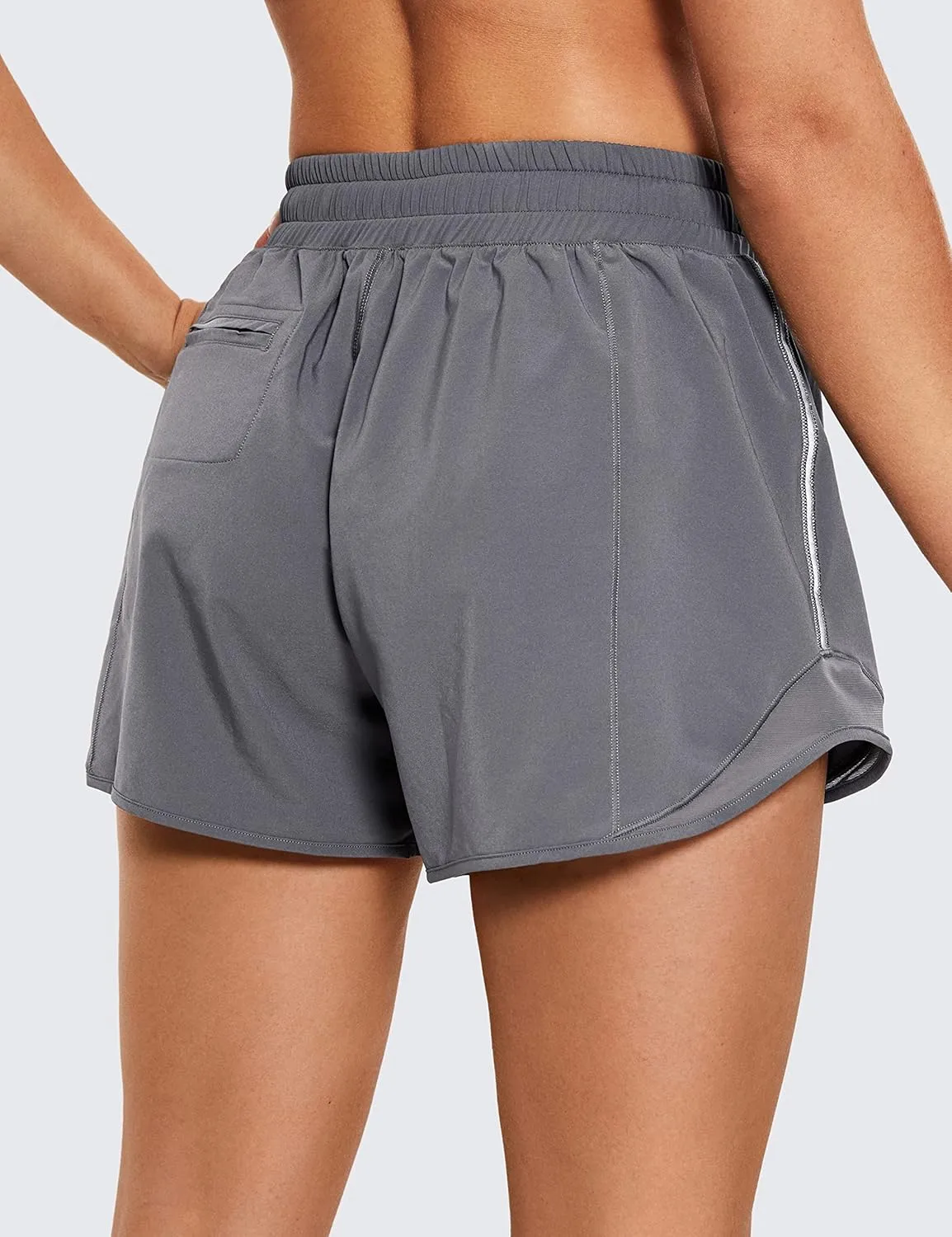 CRZ YOGA Womens Athletic Running Shorts with Zip Pocket, 4" Mid-Waist Mesh Liner Gym Workout Shorts