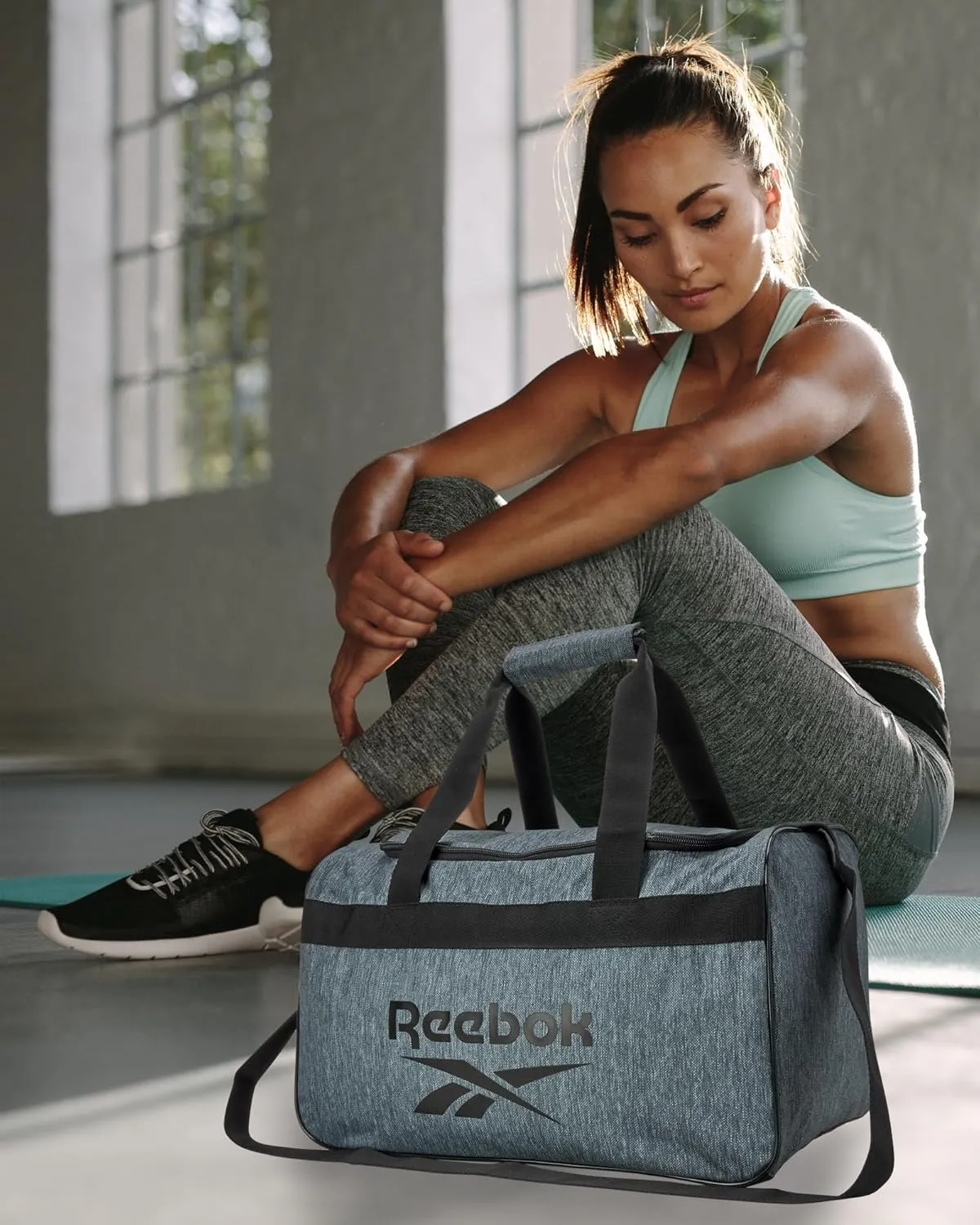 Reebok Duffle Bag – Gym Bag for Women & Men, Carry On and Overnight Duffle for Travel & Fitness, Size Small, Warrior II Light Grey