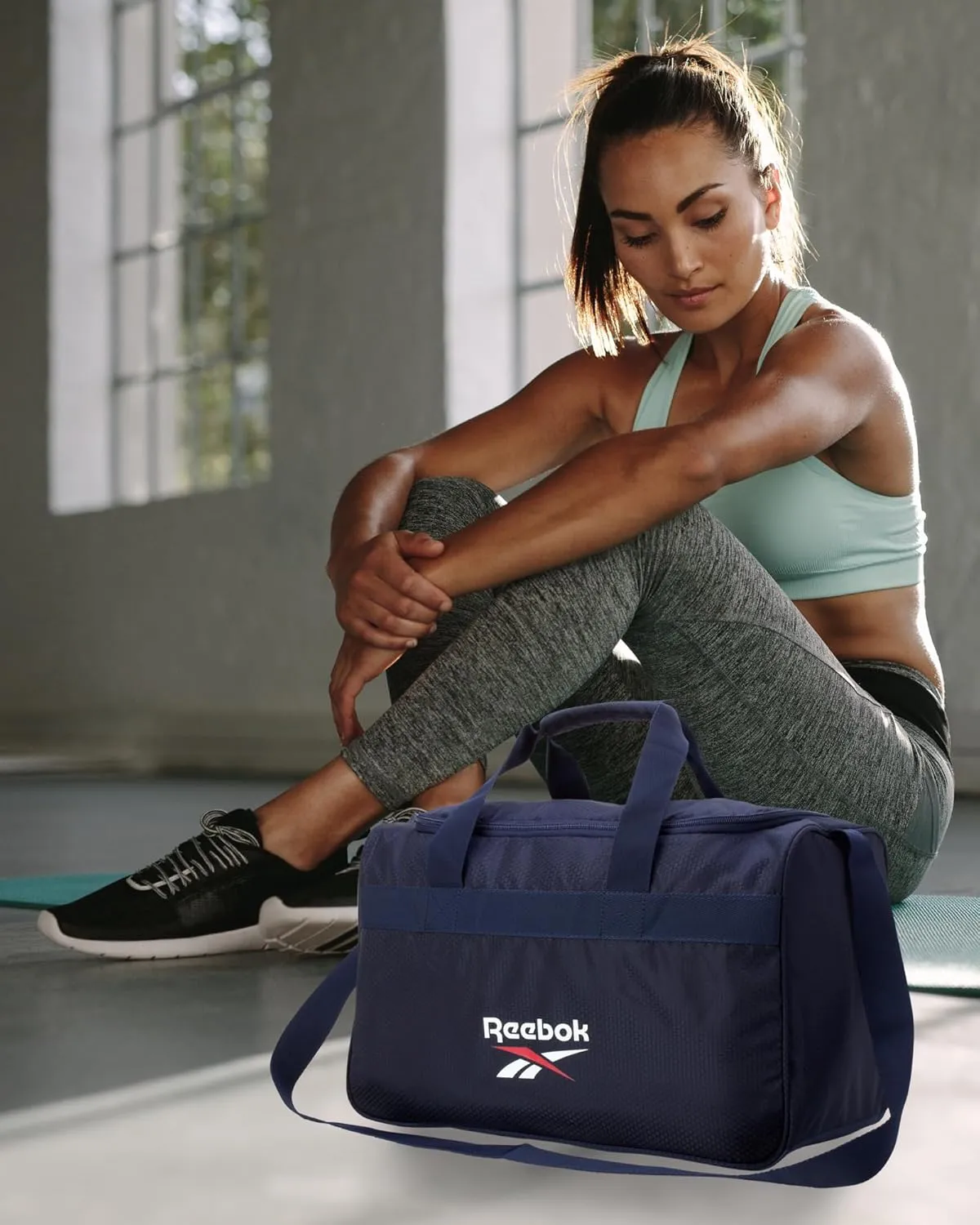 Reebok Duffle Bag – Gym Bag for Women & Men, Carry On and Overnight Duffle for Travel & Fitness, Size Small, Warrior II Navy